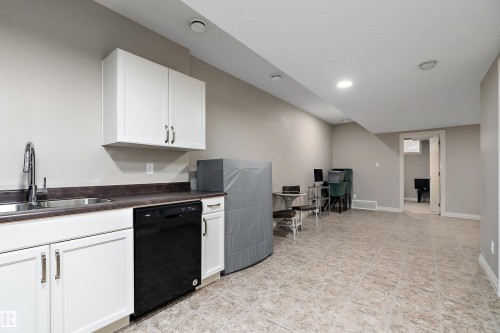 8707 221 Street, Edmonton, AB - Indoor Photo Showing Kitchen With Double Sink