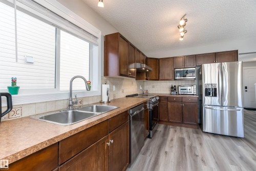 85 Sunrose Lane, Leduc, AB - Indoor Photo Showing Kitchen With Stainless Steel Kitchen With Double Sink