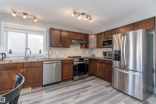 85 Sunrose Lane, Leduc, AB - Indoor Photo Showing Kitchen With Stainless Steel Kitchen With Double Sink