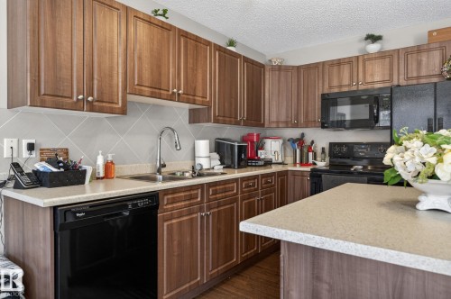12 655 Tamarack Road, Edmonton, AB - Indoor Photo Showing Kitchen With Double Sink