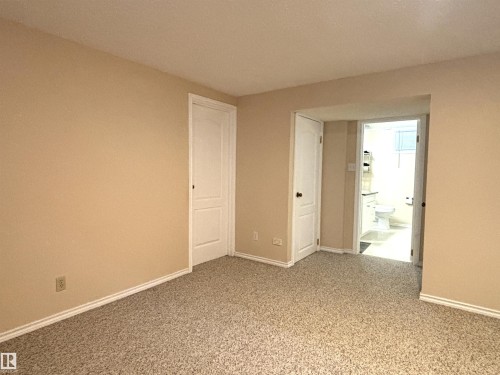 Carpeted interior space with neutral wall tones - 11139 30 Avenue, Edmonton, AB - Indoor