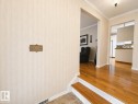 Hardwood flooring throughout entryways and living spaces - 11139 30 Avenue, Edmonton, AB  - Indoor Photo Showing Other Room 