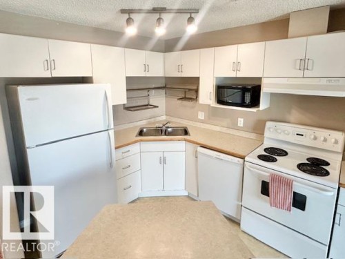 413 11325 83 Street, Edmonton, AB - Indoor Photo Showing Kitchen With Double Sink