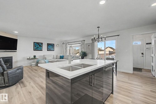 1850 Towne Centre Boulevard, Edmonton, AB - Indoor Photo Showing Kitchen With Fireplace With Double Sink