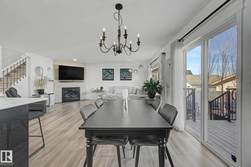 1850 Towne Centre Boulevard, Edmonton, AB - Indoor Photo Showing Dining Room With Fireplace