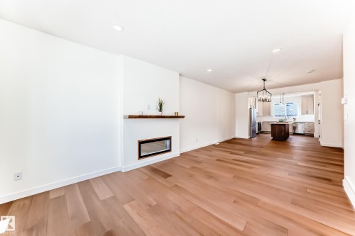 10721 70 Avenue, Edmonton, AB - Indoor Photo Showing Living Room With Fireplace
