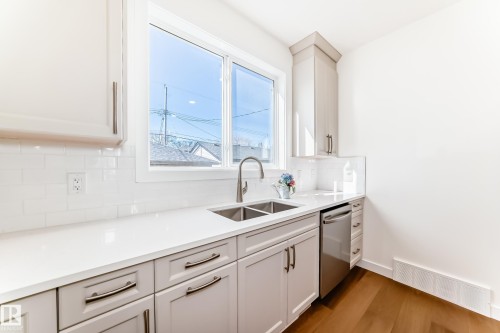 10721 70 Avenue, Edmonton, AB - Indoor Photo Showing Kitchen With Double Sink