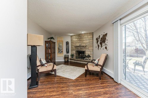 1727 65 Street, Edmonton, AB - Indoor Photo Showing Living Room With Fireplace