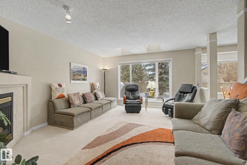 11732 10 Avenue Nw, Edmonton, AB - Indoor Photo Showing Living Room With Fireplace