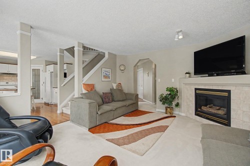 11732 10 Avenue Nw, Edmonton, AB - Indoor Photo Showing Living Room With Fireplace