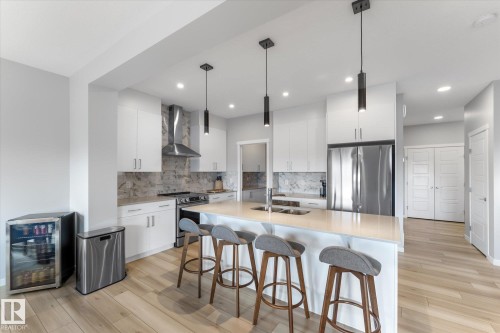 13 Empress Way, Spruce Grove, AB - Indoor Photo Showing Kitchen With Stainless Steel Kitchen With Double Sink With Upgraded Kitchen