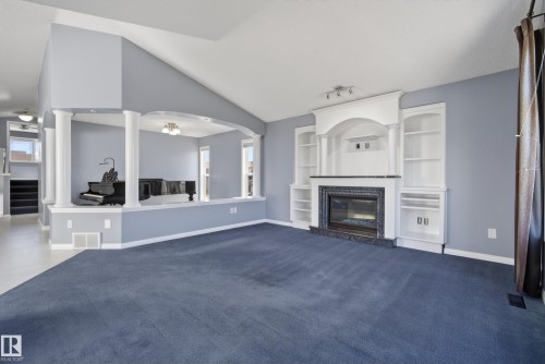 720 87 Street, Edmonton, AB - Indoor Photo Showing Living Room With Fireplace