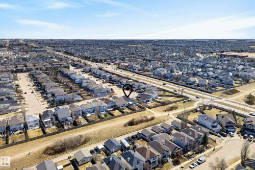 Residential neighborhood featuring single-family homes with pitched roofs and varied exterior finishes - 720 87 Street, Edmonton, AB - Outdoor With View