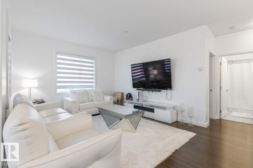 122 320 Ambleside Link Link, Edmonton, AB - Indoor Photo Showing Living Room