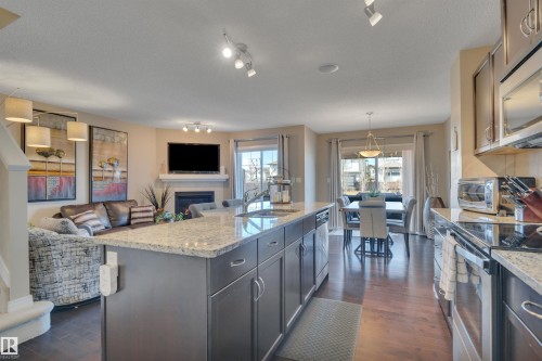 16510 135 Street, Edmonton, AB - Indoor Photo Showing Kitchen With Fireplace