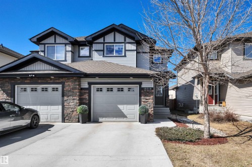 Driveway is Extra long 30'x14w - 16510 135 Street, Edmonton, AB - Outdoor With Facade