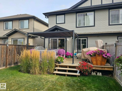 Large pressure treated deck. 13'.8"x20'.3" Gas line for BBq - 16510 135 Street, Edmonton, AB - Outdoor With Deck Patio Veranda