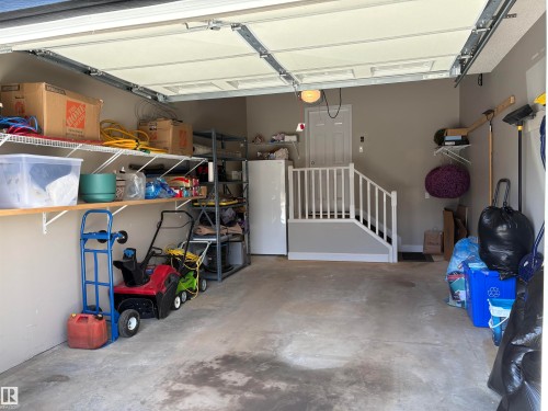 Being a former showhome this was an office space and finished to a higher level. - 16510 135 Street, Edmonton, AB - Indoor Photo Showing Garage