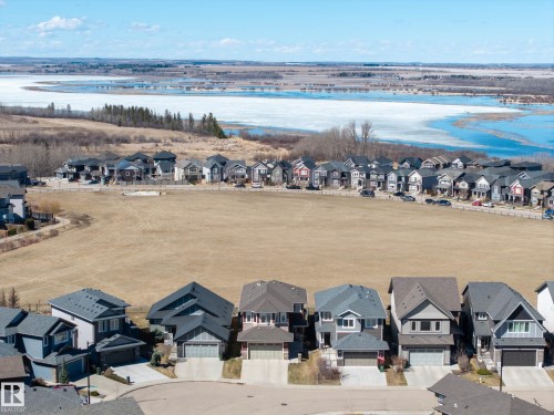 Residential development featuring contemporary homes with attached garages - 2086 Redtail Common, Edmonton, AB - Outdoor With View