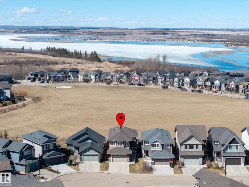 Residential property featuring a light-colored exterior and a dark roof - 2086 Redtail Common, Edmonton, AB - Outdoor With View