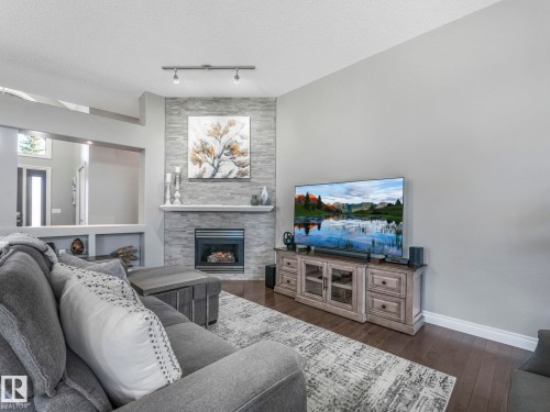 67 Leonard Drive, St. Albert, AB - Indoor Photo Showing Living Room With Fireplace