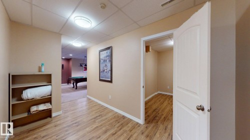 The property features wood-style flooring and light-toned walls - 613 Todd Link, Edmonton, AB - Indoor