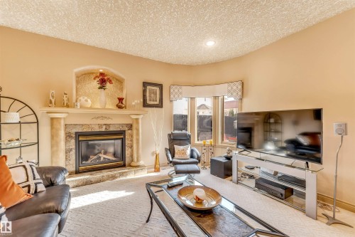 8715 160A Avenue, Edmonton, AB - Indoor Photo Showing Living Room With Fireplace
