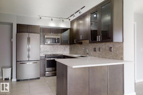 1404 10909 103 Avenue, Edmonton, AB - Indoor Photo Showing Kitchen With Stainless Steel Kitchen With Upgraded Kitchen