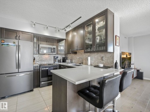 1404 10909 103 Avenue, Edmonton, AB - Indoor Photo Showing Kitchen With Stainless Steel Kitchen With Upgraded Kitchen