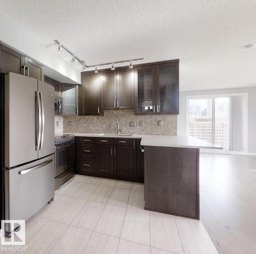 1404 10909 103 Avenue, Edmonton, AB - Indoor Photo Showing Kitchen With Double Sink With Upgraded Kitchen