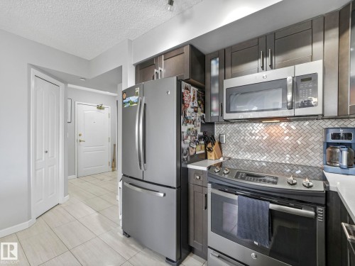 1404 10909 103 Avenue, Edmonton, AB - Indoor Photo Showing Kitchen With Stainless Steel Kitchen