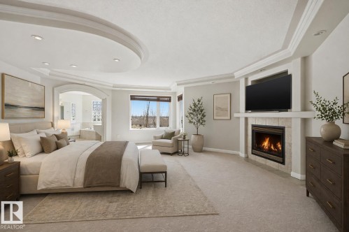 Virtually Staged - 2423 Tegler Green, Edmonton, AB - Indoor Photo Showing Bedroom With Fireplace