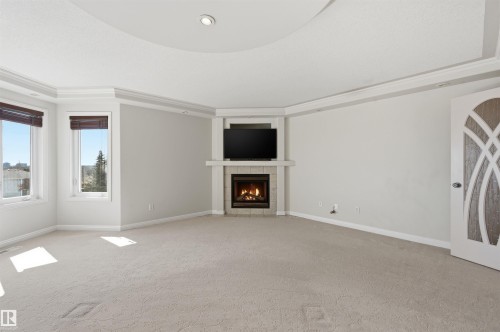 2423 Tegler Green, Edmonton, AB - Indoor Photo Showing Living Room With Fireplace