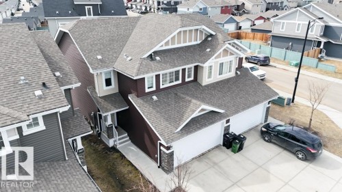 Two-story residence featuring a multi-gabled roofline and a two-car garage - 16619 14 Avenue, Edmonton, AB - Outdoor