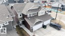 Two-story residence featuring a multi-gabled roofline and a two-car garage - 16619 14 Avenue, Edmonton, AB  - Outdoor 