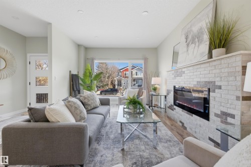 9928 151 Street Nw, Edmonton, AB - Indoor Photo Showing Living Room With Fireplace