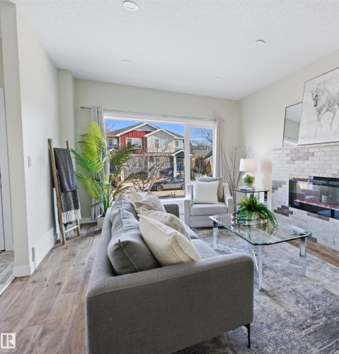 9928 151 Street Nw, Edmonton, AB - Indoor Photo Showing Living Room With Fireplace