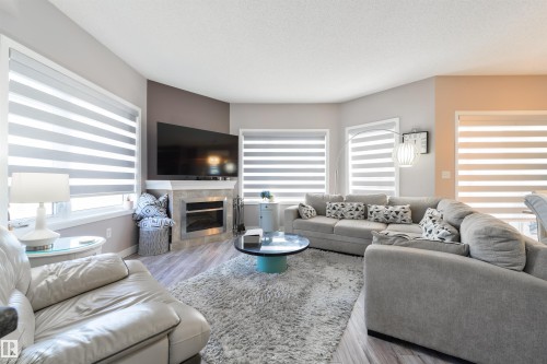 306 8931 156 Street, Edmonton, AB - Indoor Photo Showing Living Room With Fireplace