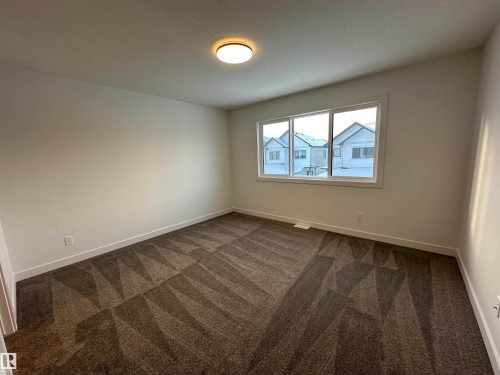 *pictures don't represent exact colours and are from another home with same layout - 65 5122 213A Street, Edmonton, AB - Indoor Photo Showing Other Room
