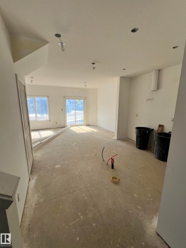 Main Floor Kitchen, Nook and Living Room - 65 5122 213A Street, Edmonton, AB - Indoor Photo Showing Other Room