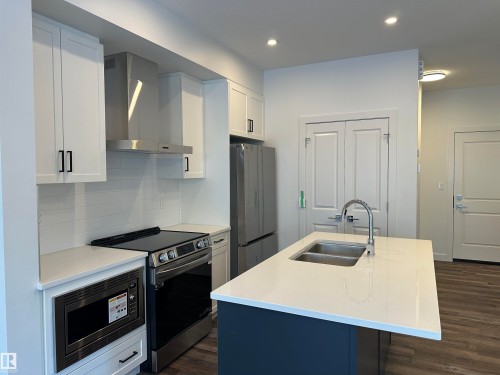*pictures don't represent exact colours and are from another home with same layout - 65 5122 213A Street, Edmonton, AB - Indoor Photo Showing Kitchen With Stainless Steel Kitchen With Double Sink With Upgraded Kitchen