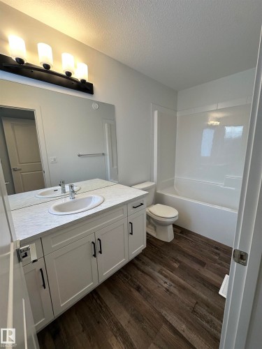 Ensuite *pictures don't represent exact colours and are from another home with same layout - 65 5122 213A Street, Edmonton, AB - Indoor Photo Showing Bathroom