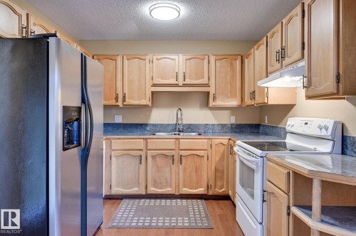 10634 158 Avenue, Edmonton, AB - Indoor Photo Showing Kitchen With Double Sink