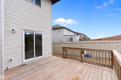 Spacious wood deck with a full wood railing - 3314 9 Street Nw, Edmonton, AB - Outdoor With Deck Patio Veranda With Exterior
