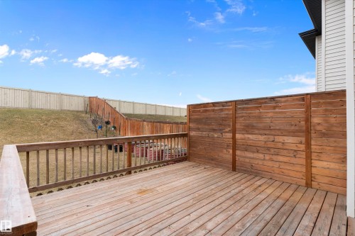 Spacious wooden deck with a privacy wall - 3314 9 Street Nw, Edmonton, AB - Outdoor With Exterior