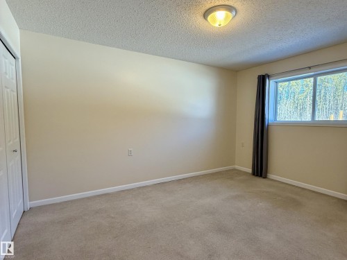 4 5011 Pine Drive, Cherry Grove, AB - Indoor Photo Showing Other Room