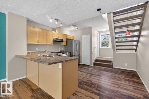 130 5604 199 Street, Edmonton, AB - Indoor Photo Showing Kitchen With Double Sink