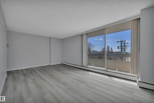 210 10883 Saskatchewan Drive, Edmonton, AB - Indoor Photo Showing Other Room