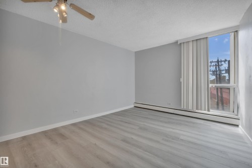 210 10883 Saskatchewan Drive, Edmonton, AB - Indoor Photo Showing Other Room