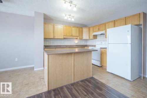 2887 23 Street Nw, Edmonton, AB - Indoor Photo Showing Kitchen